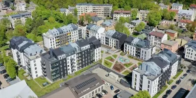 an overhead view of a city with tall buildings at Urban Loft Escape Kaunas Center in Kaunas