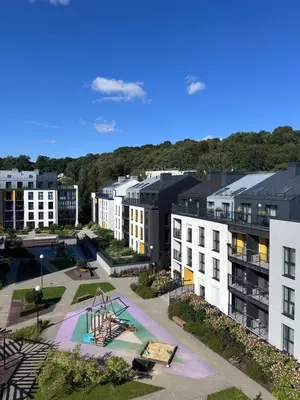 an aerial view of an apartment complex with a playground at Urban Loft Escape Kaunas Center in Kaunas