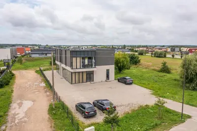 an aerial view of a house with two cars parked at Studija 17 rooms II in Kaunas