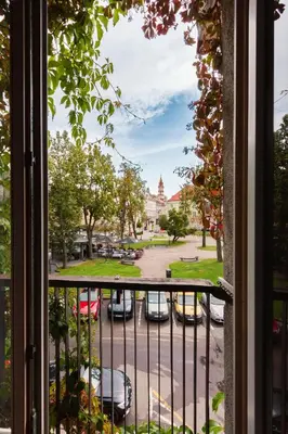a view from a window of a parking lot at French Park View Apartment in Vilnius