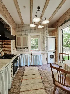 a kitchen with a sink and a stove top oven at Provance style villa in regional park! in Šilėnai