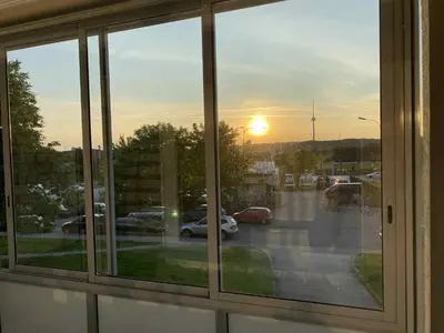 a view from a window of a parking lot at VILNIUS apartment with balcony in Vilnius