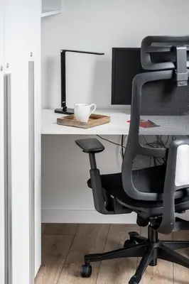 an office with a desk with a chair and a computer at Top Floor, Spacious Apartment w-Balcony & Garage I Cohost in Vilnius