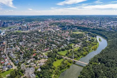 an aerial view of a city with a river and a bridge at Embassy Studio 303 in Vilnius