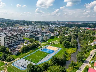 an aerial view of a city with a swimming pool at Luxury Private Apartment near Old Town and Nature in Vilnius