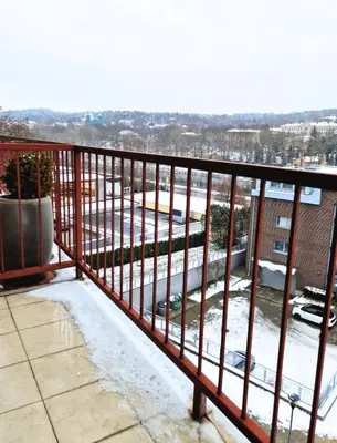 a balcony with snow on the ground at Panorama Apartment Balcony Work Castle View in Vilnius