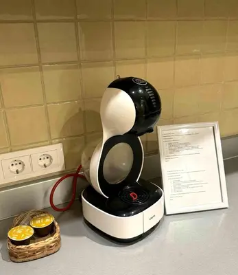 a blender sitting on a counter next to a box at Panorama Apartment Balcony Work Castle View in Vilnius