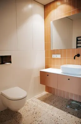 a bathroom with a toilet and a sink at City Breeze Flat, Self Ceck-In, Free parking in Vilnius