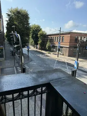 a view of a city street from a balcony at Downtown Kaunas - Maironis 10 in Kaunas