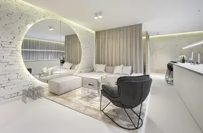 a living room with a couch and a chair at Provokatas in Kaunas