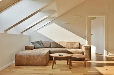 a living room with a couch and a table at Domillion Penthouse 2bdr 2bath P364a in Vilnius