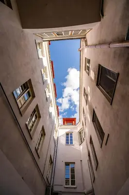 a view from a building looking up at the sky at Domillion new modern 2bdr City Hall apt D1117B in Vilnius