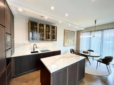 a kitchen with a sink and a table in a room at sf ghjk in Užliedžiai