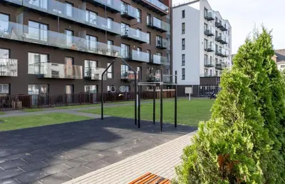 a park in front of a apartment building at Vincent Sunlight Stay - Near Clinic, Arena and Stadium in Kaunas