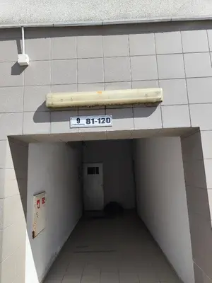 a subway tunnel with a sign on top of it at Jaukūs apartamentai in Vilnius