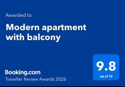 a blue screen with the text modern appointment with bakery at Modern apartment with balcony in Užliedžiai