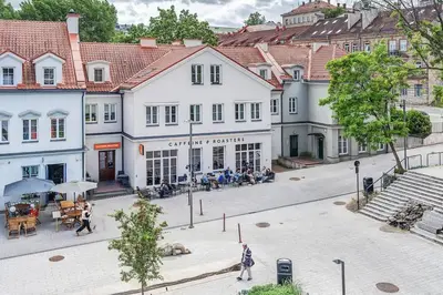 an overhead view of a city street with buildings at Domillion Penthouse Duplex w Terrace 18 ppl P36T in Vilnius