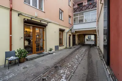 an empty street in an alley between two buildings at Domillion 1bdr Traku str apt&free parking Tr135 in Vilnius