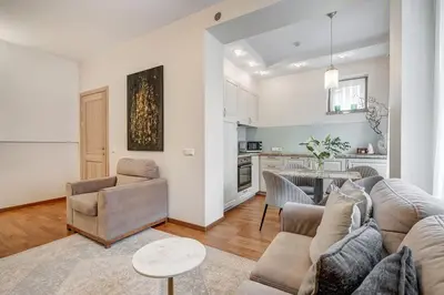 a living room with a couch and a table at Domillion New Old Town Amber 1bdr Z1B4 in Vilnius