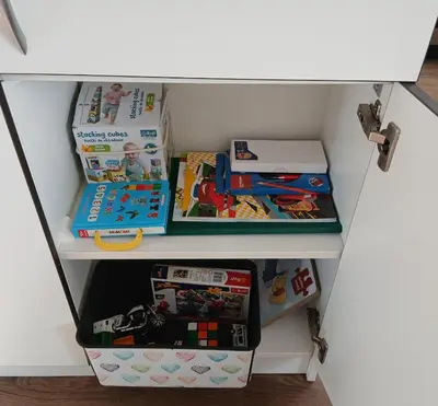 a childs play room with toys on a shelf at Alytus Studio 45 in Alytus