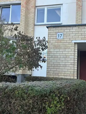 a house with the number on the side of it at Projektuotojų Apartamentai in Panevėžys