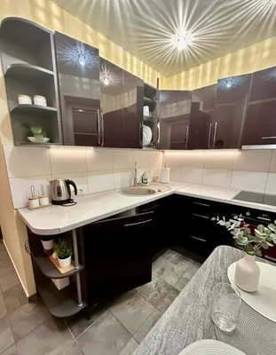 a kitchen with a sink and a counter top at Victoria Central Apartamentai in Druskininkai