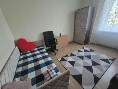 a living room with a couch and a chair at Entrara in VNO