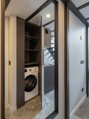 a laundry room with a washer and dryer at Golden loft in City centre Self check-in No 38 in Vilnius