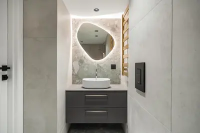 a bathroom with a sink and a mirror at Golden loft in City centre Self check-in No 38 in Vilnius