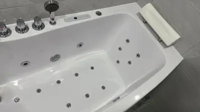 a white bath tub in a bathroom at Lovely Flat with Great Central Location Kaunas in Kaunas