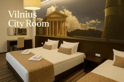 a bedroom with two beds and a city room at Vilnius City Room in Vilnius