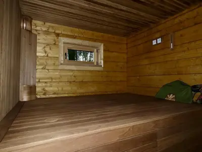 a room in a log cabin with a window at Lake terrace