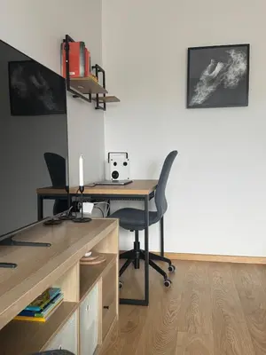 an office with a desk and a chair at Studio Apartment with Balcony in Central Druskininkai in Druskininkai