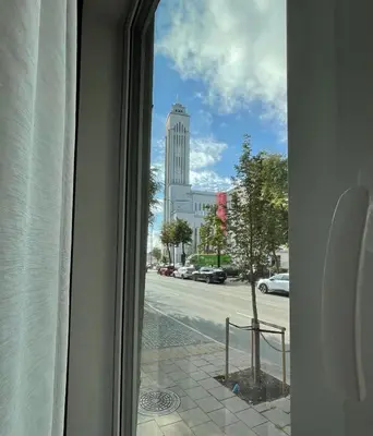 a view of a city street from a window at Apartment 52 in Kaunas