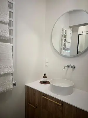 a bathroom with a sink and a mirror at Designer studio in Vilnius