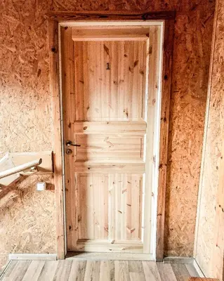 an open door in a house under construction at Sodyba prie Mūšos