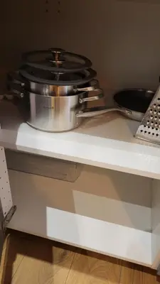 a pot and pans sitting on a shelf at Old town studio in Kaunas