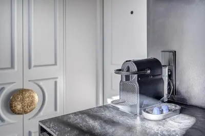 a kitchen sink with a mixer on a counter at New! Design OLD TOWN apartment in Vilnius