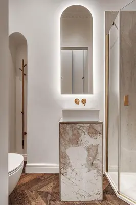 a bathroom with a sink and a toilet and a mirror at New! Design OLD TOWN apartment in Vilnius