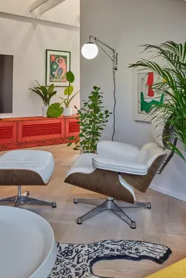 a living room with two chairs and a table at Pop Haus Vilnius in Vilnius