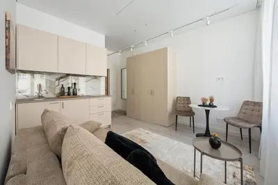 a living room with a couch and a table at Close to Old Town & Amenities 1 in Vilnius
