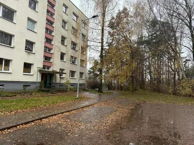 an empty street in front of a building at Two Bedroom Apartment LAZDYNAI in Vilnius