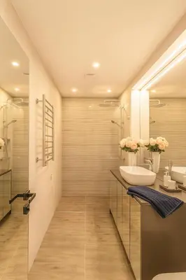 a bathroom with a sink and a mirror at Self Check-in Apartment in Vilnius