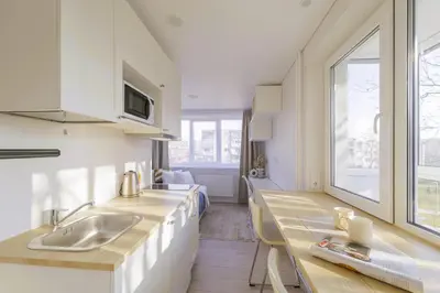 a kitchen with a sink and a counter at Vilnius prie centro ramybė tarp medžių in Vilnius