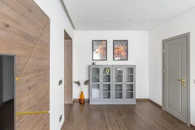 an empty room with white walls and a door at Kaunas old town apartment in Kaunas