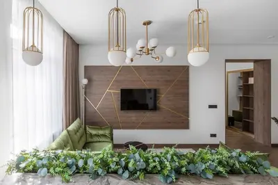 a living room with a couch and a tv at Kaunas old town apartment in Kaunas