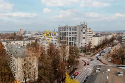 a view of a city with a kite in the sky at Cosy 2 Bed Flat in Naujamiestis in Vilnius