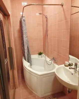 a bathroom with a bath tub and a sink at Cozy Fryko Era Home - 1929, 2 double beds in Kaunas
