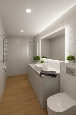 a bathroom with a sink and a toilet and a mirror at Self Check-in Home in Vilnius center in Vilnius