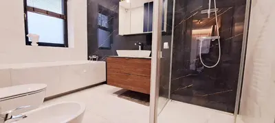 a bathroom with a shower and a toilet and a sink at White house in Vilnius in Vilnius